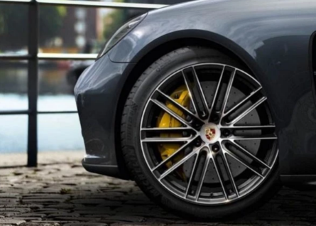 What causes tire noise in cars, and what should be done if the tire noise is loud?